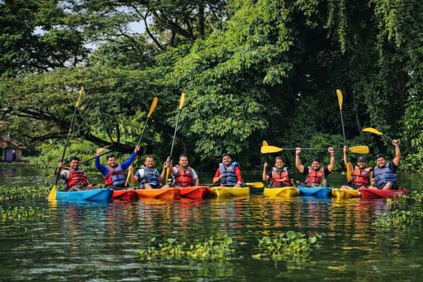 Adventure kayaking through extended backwater routes in Alleppey