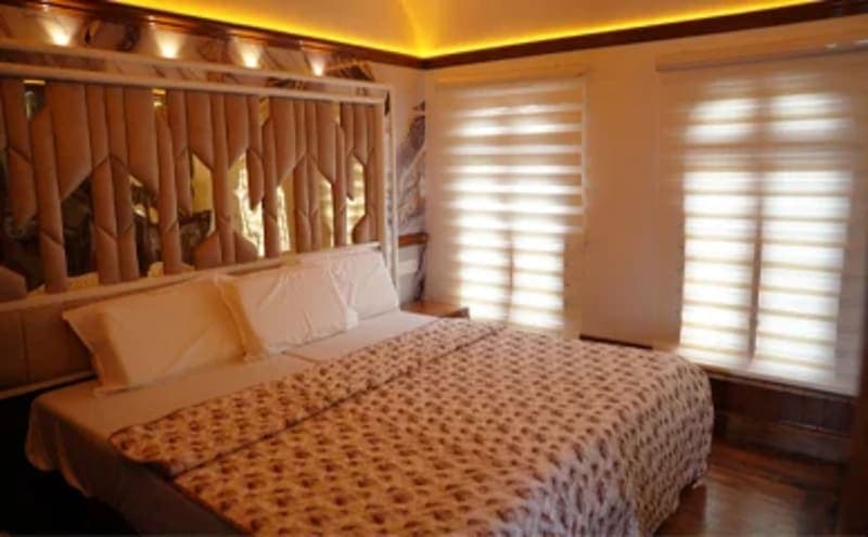 Luxury Kerala houseboat interior for overnight backwater stay in Alleppey