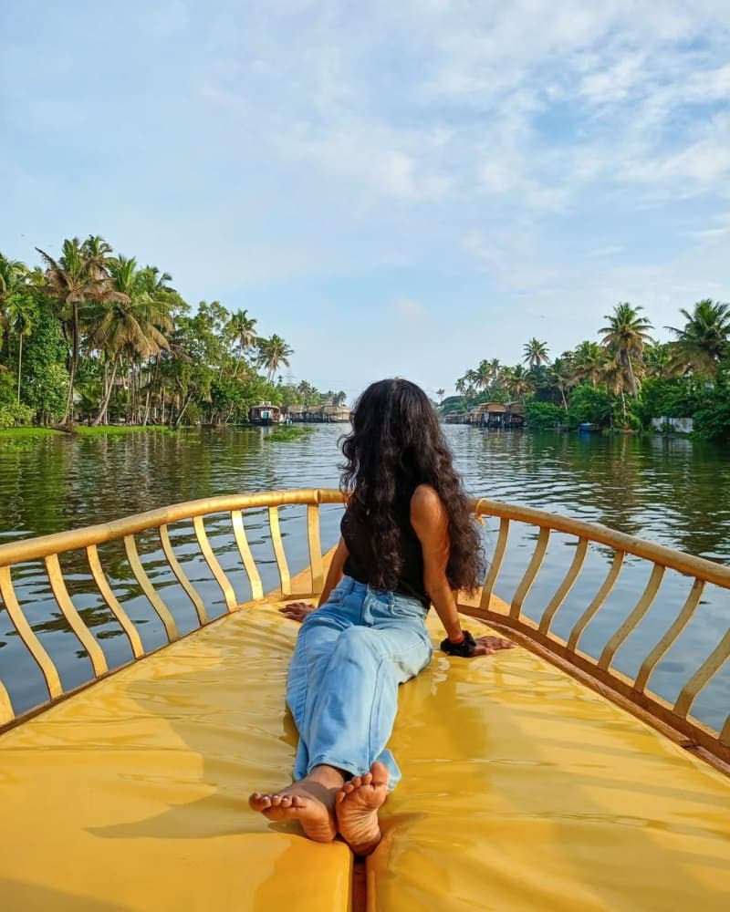 Traditional shikara boat ride through Kerala backwater canals